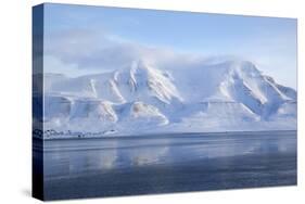 Hiorthfjellet Mountain, Adventfjorden (Advent Bay) Fjord with Sea Ice in Foreground, Svalbard-Stephen Studd-Stretched Canvas