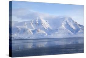 Hiorthfjellet Mountain, Adventfjorden (Advent Bay) Fjord with Sea Ice in Foreground, Svalbard-Stephen Studd-Stretched Canvas