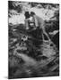 Hippie Couple Kissing at Woodstock Music Festival-Bill Eppridge-Mounted Photographic Print