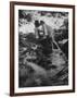 Hippie Couple Kissing at Woodstock Music Festival-Bill Eppridge-Framed Photographic Print