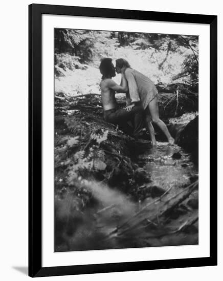 Hippie Couple Kissing at Woodstock Music Festival-Bill Eppridge-Framed Photographic Print