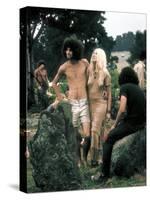 Hippie Couple Posed Together Arm in Arm with Others Around Them, During Woodstock Music/Art Fair-John Dominis-Stretched Canvas