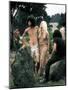 Hippie Couple Posed Together Arm in Arm with Others Around Them, During Woodstock Music/Art Fair-John Dominis-Mounted Photographic Print
