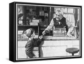 His First Pencil (or Boy and Shopkeeper)-Norman Rockwell-Framed Stretched Canvas