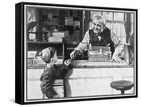His First Pencil (or Boy and Shopkeeper)-Norman Rockwell-Framed Stretched Canvas