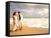 Hispanic Couple Walking Together on the Beach-Bill Bachmann-Framed Stretched Canvas