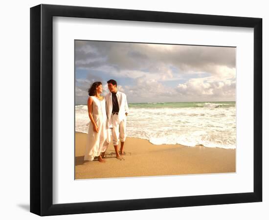 Hispanic Couple Walking Together on the Beach-Bill Bachmann-Framed Photographic Print