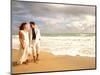 Hispanic Couple Walking Together on the Beach-Bill Bachmann-Mounted Photographic Print