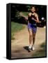 Hispanic Woman Running for Exercise, New York, New York, USA-Paul Sutton-Framed Stretched Canvas