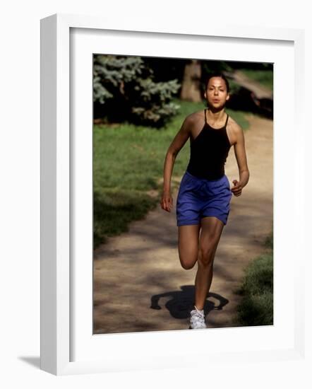 Hispanic Woman Running for Exercise, New York, New York, USA-Paul Sutton-Framed Photographic Print