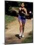 Hispanic Woman Running for Exercise, New York, New York, USA-Paul Sutton-Mounted Photographic Print