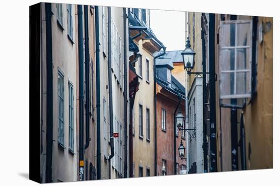 Historic and colorful buildings in Hell's Alley, Gamla Stan, Stockholm, Sweden, Scandinavia, Europe-Jon Reaves-Stretched Canvas