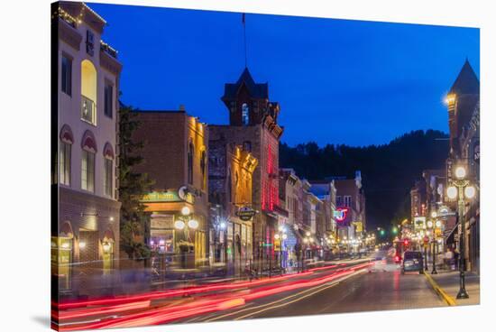 Historic Main Street at Dusk in Deadwood, South Dakota, Usa-Chuck Haney-Stretched Canvas