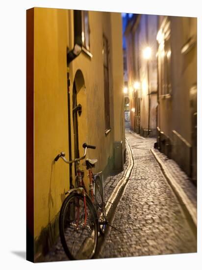 Historic Old Street in Gamla Stan (Old Town) in Stockholm, Sweden-Peter Adams-Stretched Canvas