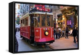Historic Red Tram on Istiklal Caddesi, Beyoglu, Istanbul, Turkey, Europe-Neil Farrin-Framed Stretched Canvas