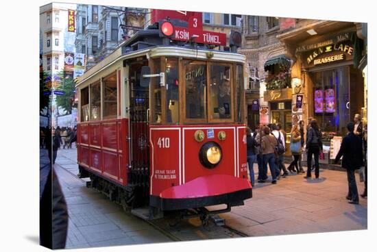 Historic Red Tram on Istiklal Caddesi, Beyoglu, Istanbul, Turkey, Europe-Neil Farrin-Stretched Canvas