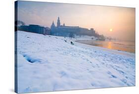 Historic Royal Wawel Castle in Cracow, Poland, with Frozen Vistula River in Winter.-dziewul-Stretched Canvas
