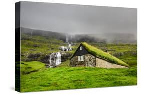 Historic Stone House with Turf Roof on the Island of Streymoy, Saksun, Faroe Islands-Nick Fox-Stretched Canvas