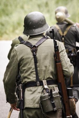 https://imgc.allpostersimages.com/img/posters/historical-reenactment-german-soldiers-of-26th-panzer-division_u-L-PUY0TE0.jpg?artPerspective=n