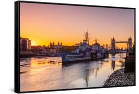 HMS Belfast and Tower Bridge at sunrise with a low tide on the River Thames, London-Ed Hasler-Framed Stretched Canvas