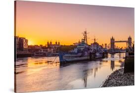 HMS Belfast and Tower Bridge at sunrise with a low tide on the River Thames, London-Ed Hasler-Stretched Canvas