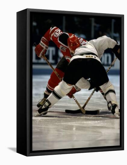 Hockey Players in Head to Head Competition-null-Framed Stretched Canvas