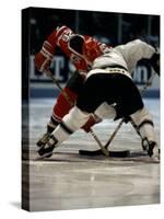 Hockey Players in Head to Head Competition-null-Stretched Canvas