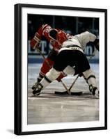 Hockey Players in Head to Head Competition-null-Framed Premium Photographic Print