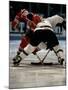 Hockey Players in Head to Head Competition-null-Mounted Premium Photographic Print