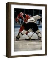 Hockey Players in Head to Head Competition-null-Framed Photographic Print