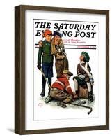 "Hockey Waits, Tying Skates," Saturday Evening Post Cover, December 17, 1927-Alan Foster-Framed Premium Giclee Print