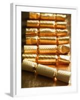 Holiday Candies Wrapped in Gold-null-Framed Photographic Print