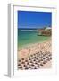 Holidaymakers Sunbathing under Beach Umbrellas-Neale Clark-Framed Photographic Print