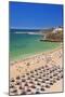 Holidaymakers Sunbathing under Beach Umbrellas-Neale Clark-Mounted Photographic Print