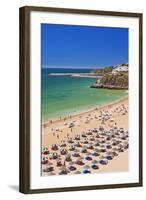 Holidaymakers Sunbathing under Beach Umbrellas-Neale Clark-Framed Photographic Print