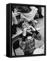 Hollywood Child Timmy Garry at Children's party Dressed in Cowboy Outfit eating a Hamburger-J^ R^ Eyerman-Framed Stretched Canvas