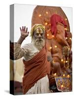 Holy Man in Front of a Ganesh Statue Draped in Fairy Lights at the Hindu Festival of Shivaratri-Don Smith-Stretched Canvas