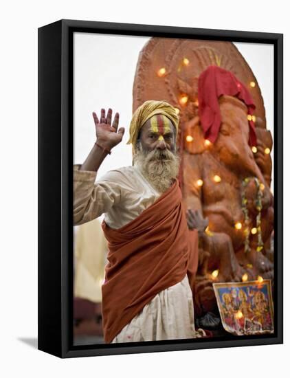 Holy Man in Front of a Ganesh Statue Draped in Fairy Lights at the Hindu Festival of Shivaratri-Don Smith-Framed Stretched Canvas