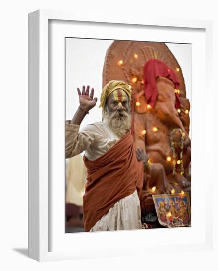 Holy Man in Front of a Ganesh Statue Draped in Fairy Lights at the Hindu Festival of Shivaratri-Don Smith-Framed Photographic Print