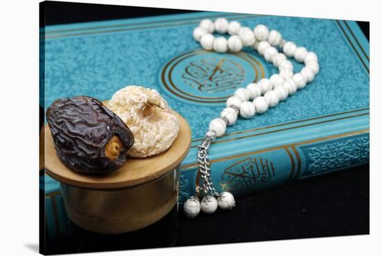 Holy Quran book with prayer beads and date, Ramadan concept, Muslim faith and religion, France-Godong-Stretched Canvas