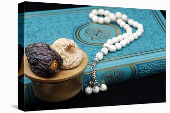 Holy Quran book with prayer beads and date, Ramadan concept, Muslim faith and religion, France-Godong-Stretched Canvas