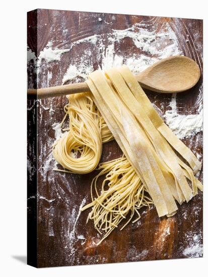 Home-Made Pasta with Wooden Spoon-null-Stretched Canvas