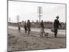 Homeless Migrant Family of Seven, Walking the Highway from Phoenix, Arizona, 1939-Dorothea Lange-Mounted Art Print