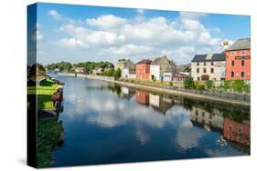 Homes line a canal in Kilkenny, County Kilkenny, Leinster, Republic of Ireland, Europe-Logan Brown-Stretched Canvas