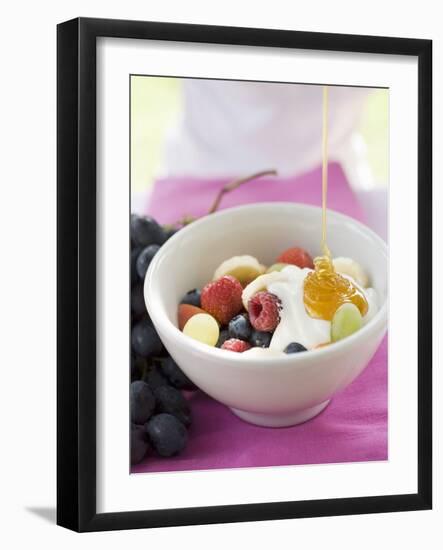 Honey Running onto Fruit Muesli with Yoghurt-null-Framed Photographic Print