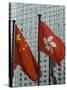 Hong Kong and Chinese Flags Fly in Central, Hong Kong, China-Amanda Hall-Stretched Canvas