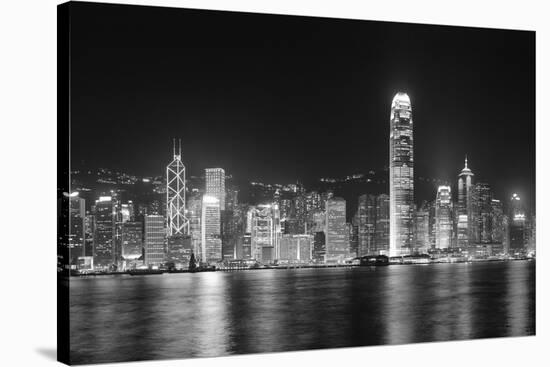 Hong Kong City Skyline at Night over Victoria Harbor with Clear Sky and Urban Skyscrapers.-Songquan Deng-Stretched Canvas