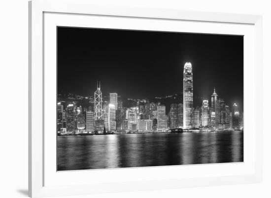 Hong Kong City Skyline at Night over Victoria Harbor with Clear Sky and Urban Skyscrapers.-Songquan Deng-Framed Photographic Print