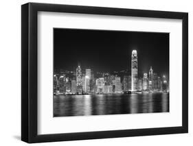 Hong Kong City Skyline at Night over Victoria Harbor with Clear Sky and Urban Skyscrapers.-Songquan Deng-Framed Photographic Print
