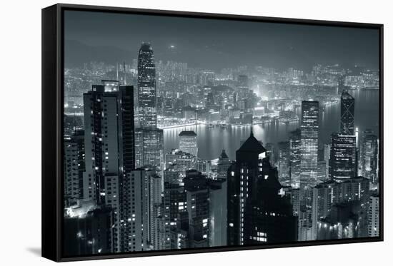 Hong Kong City Skyline At Night With Victoria Harbor And Skyscrapers Illuminated-Songquan Deng-Framed Stretched Canvas